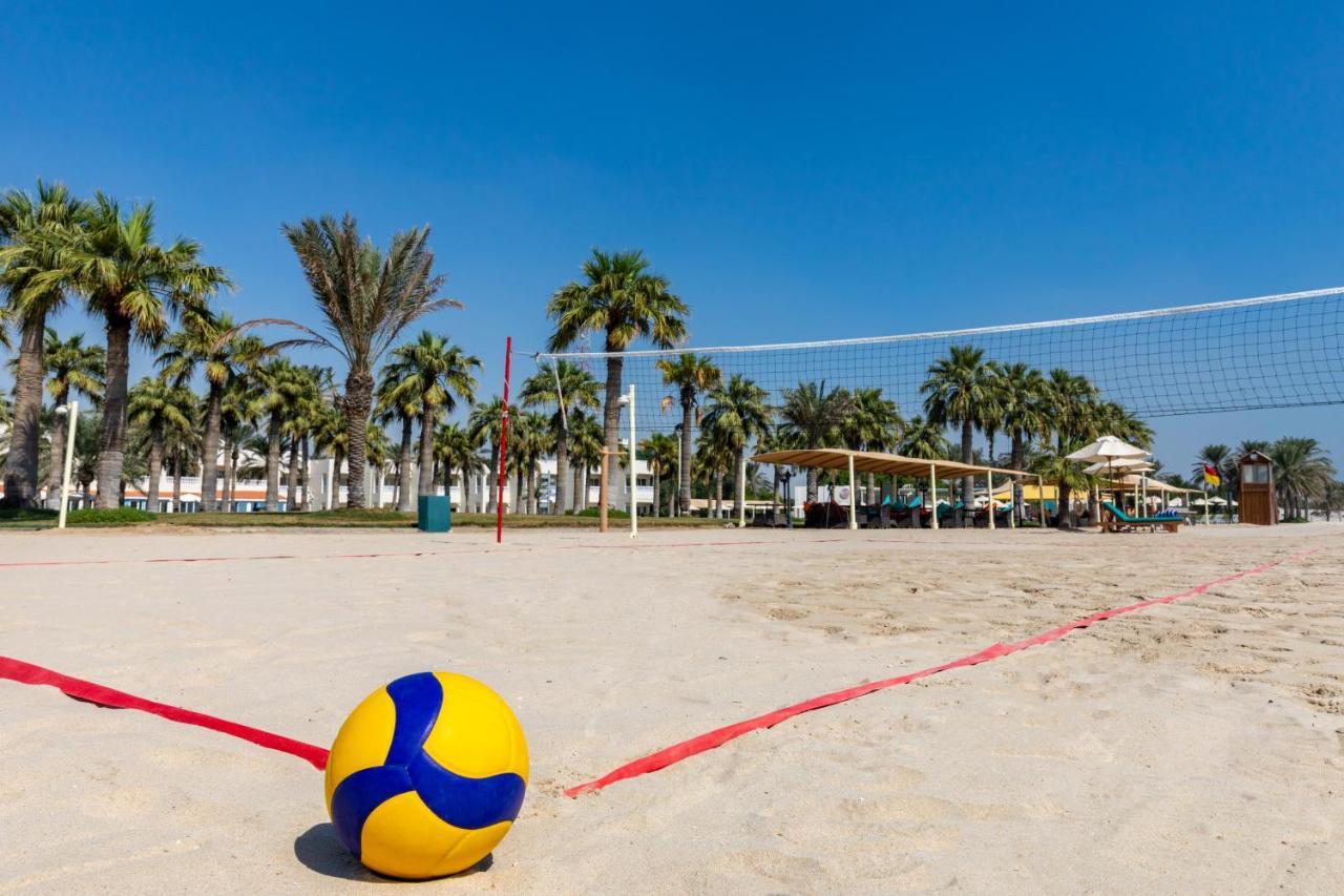 Sealine Beach, A Murwab Resort Mesaieed Buitenkant foto A beach volleyball court