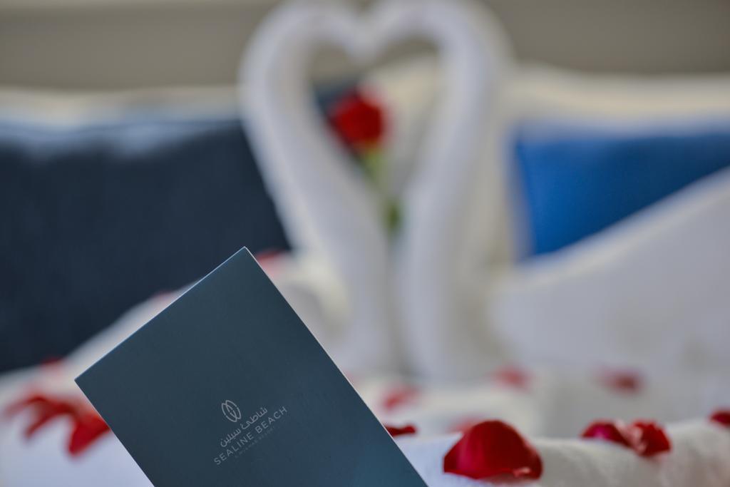 Sealine Beach, A Murwab Resort Mesaieed Buitenkant foto A menu at the Waldorf Astoria Ras Al Khaimah